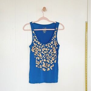 true 2000s vintage Ecko Unltd. blue with gold leopard print tank top